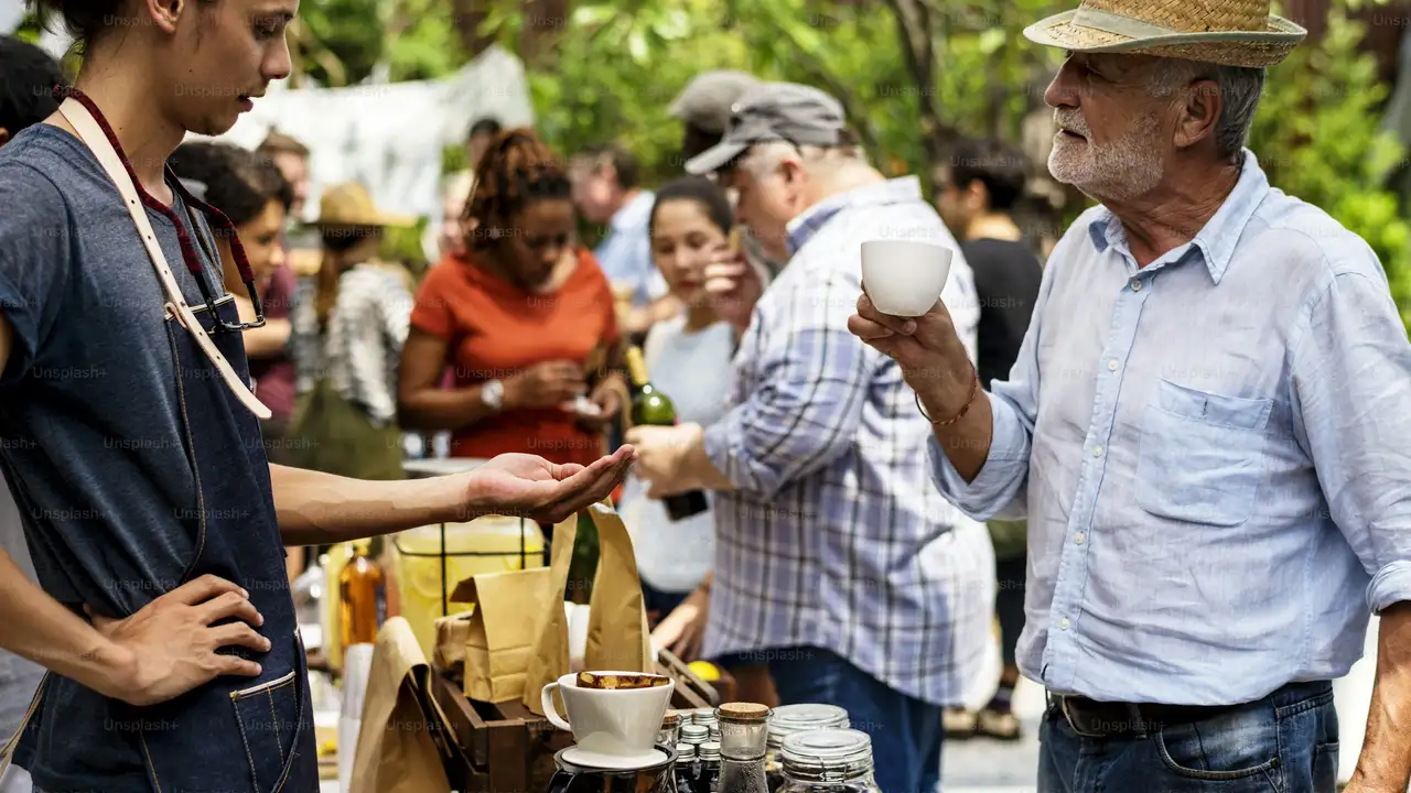 overhead view of corned beef sliced and on a platter with cabbage, potatoes, and carrots